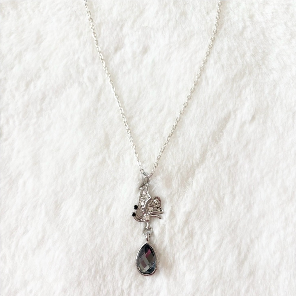 Silver Butterfly Pendant Necklace with Purple Teardrop Crystal